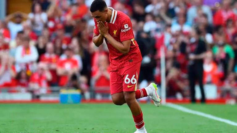 Liverpool defender Trent Alexander-Arnold was booed by his club’s fans © PETER POWELL / AFP