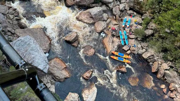 Kayaker’s leg was amputated after getting trapped in Australian river rocks - / TASMANIA POLICE/AFP/File