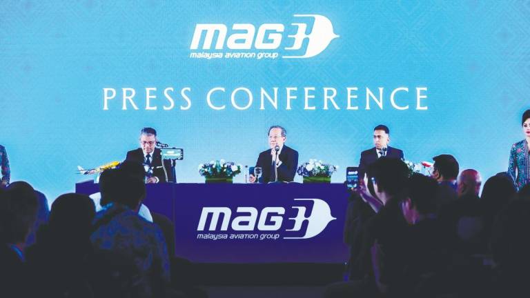 Izham (centre) speaking at the press conference at Matta Fair 2025.