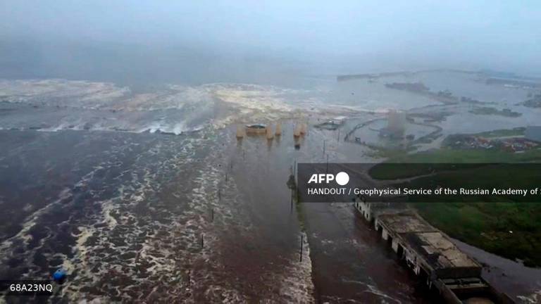 This video grab from a drone handout footage released by Geophysical Service of the Russian Academy of Sciences on July 30, 2025, shows the tsunami-hit Severo-Kurilsk on Paramushir island of Russia's northern Kuril islands. One of the strongest earthquakes ever recorded struck Russia's sparsely populated Far East early on July 30, causing tsunamis of up to four metres (12 feet) across the Pacific and sparking evacuations from Hawaii to Japan. - Handout / Geophysical Service of the Russian Academy of Sciences / AFP