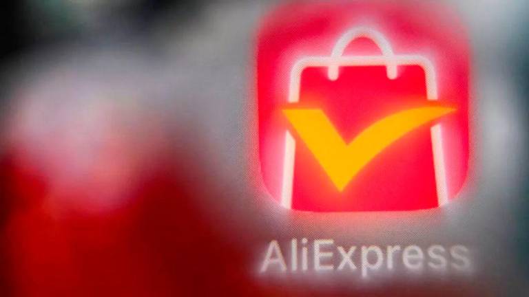 The EU opened an investigation in March 2024 into AliExpress, owned by Alibaba, over suspected breaches of rules aimed at countering the spread of illegal goods and content online © Kirill KUDRYAVTSEV / AFP