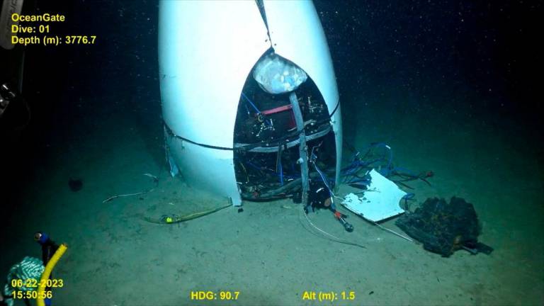 Footage from a remotely operated vehicle shows, what the Coast Guard Marine Board of Investigation says is the debris of the Titan submersible that imploded while diving to the wreck of the Titanic, on the seafloor, September 17, 2024, in this still image from video. U.S. Coast Guard video courtesy of Pelagic Research Services/Handout via REUTERS