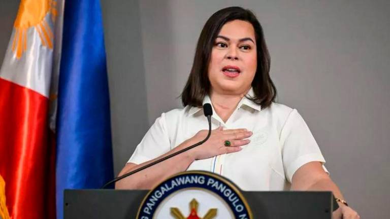 Philippine Vice President Sara Duterte gives a statement on impeachment complaints filed against her at her office in Metro Manila © JAM STA ROSA / AFP/File