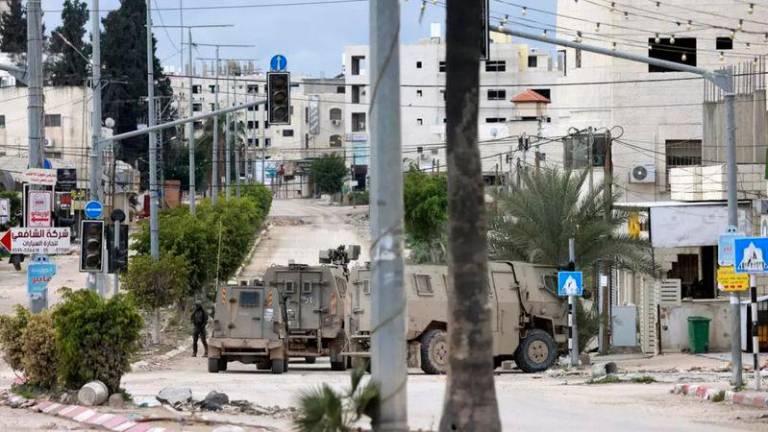 Israeli troops at the entrance to the occupied West Bank refugee camp of Tulkarem © Jaafar ASHTIYEH / AFP