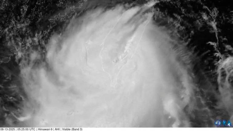 A satellite view shows Typhoon Podul blowing through Taiwan, August 13, 2025, in this screengrab taken from video obtained from social media. CSU/CIRA &amp; JMA/JAXA/via REUTERS