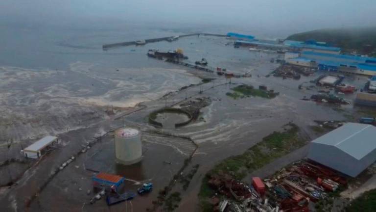 Tsunami waves flood an area after a powerful magnitude 8.8 earthquake struck off Russia’s far eastern Kamchatka Peninsula, in Severo-Kurilsk, Sakhalin Region, Russia, July 30, 2025, in this still image taken from video. Kamchatka branch of the Geophysical Survey of the Russian Academy of Sciences/Handout via REUTERS