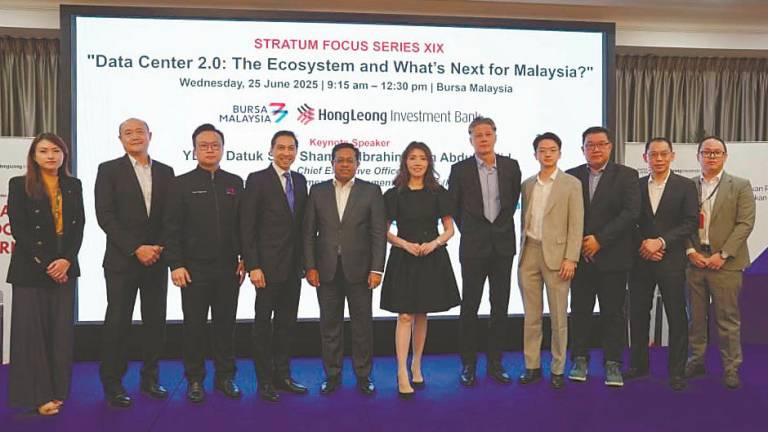 From left: Bursa Malaysia head of investor development Stephanie Tan, Hong Leong Investment Bank (HLIB) head of dealing (corporate and institutional business group – public) Wan Kharuddin Ungku Md Khalid, MN Holdings managing director Datuk Toh Eng Keat, Fad’l, Sikh Shamsul, Lee, IJM Construction Sdn Bhd CEO Wong Heng Wai, JLL Malaysia director of data centre transactions Kent Seet Tiong Hong, Master Tec Group executive director and CEO Tee Kok Hwa, and HLIB head of broking Allen Tan Jee Khien and acting head of research Chan Jit Hoong.