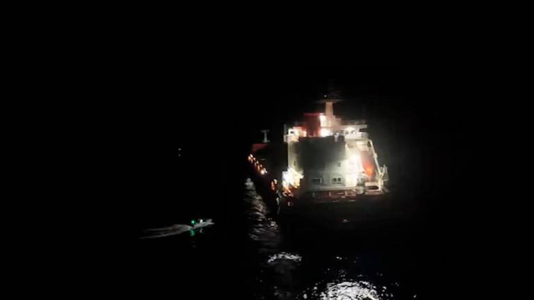 Personnel from EU maritime mission Eunavfor Aspides’ carry out rescue operation following an attack by Yemen’s Houthi on the Dutch-flagged general cargo ship Minervagracht, which caught fire in the Gulf of Aden on Monday, in this screengrab taken from handout video released on September 30, 2025. Eunavfor Aspides via X/Handout via REUTERS