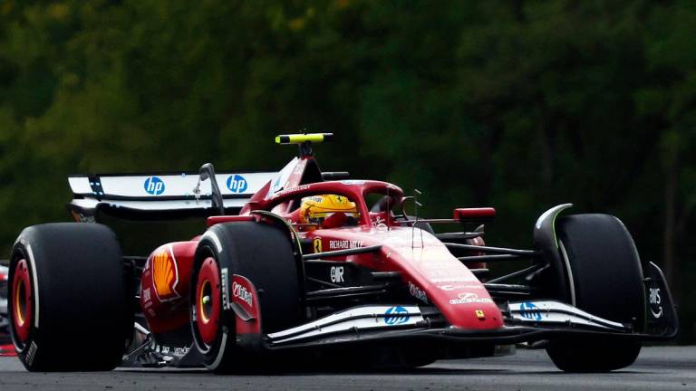 Ferrari’s Lewis Hamilton in action during the race. - REUTERS/Jakub Porzycki