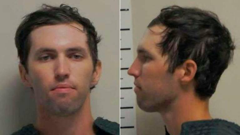 This combination of pictures created on September 13, 2025 using handouts released by the Utah Governor’s Office on September 13, 2025 shows the booking photos of Tyler Robinson, the suspect in the shooting death of right-wing activist Charlie Kirk- “AFP PHOTO / Utah Governor’s Office