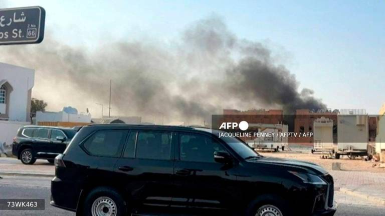 Smoke billowing after explosions in Doha’s capital Qatar on September 9, 2025. (Photo by Jacqueline PENNEY / AFPTV / AFP)