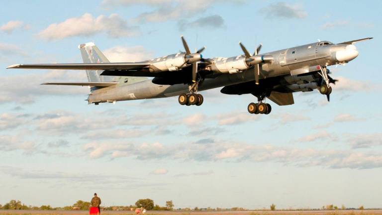 A Russian TU-95 bomber, or Bear, lands at a military airbase in Engels, some 900 km (559 miles) south of Moscow, August 7, 2008. - REUTERSPIX