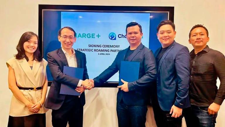 From left: Charge+ COO Koh Xiao Han, Goh Chee Kiong, James Goh, ChargeSini head of product Nick Leong and ChargeSini financial controller Yaw Wee Sinn. – Charge+ pic