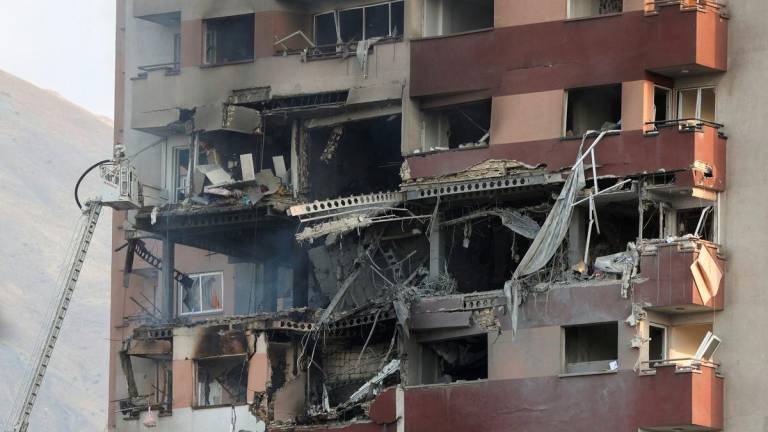 A building stands damaged in the aftermath of Israeli strikes, in Tehran, Iran, June 13, 2025. - REUTERSPIX