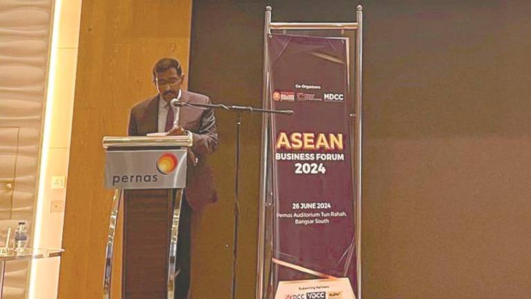 Sivasuriyamoorthy delivering his keynote address at the Asean Business Forum 2024.