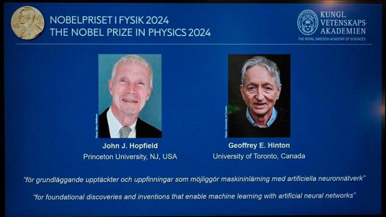 US physicist John J Hopfield and Canadian-British computer scientist and cognitive psychologist Geoffrey E Hinton - AFPpix