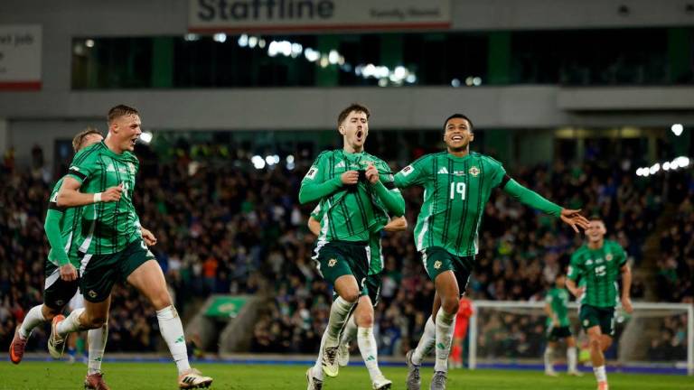 Northern Ireland’s Trai Hume celebrates scoring their second goal with Danny Ballard and Shea Charles. Reuterspix