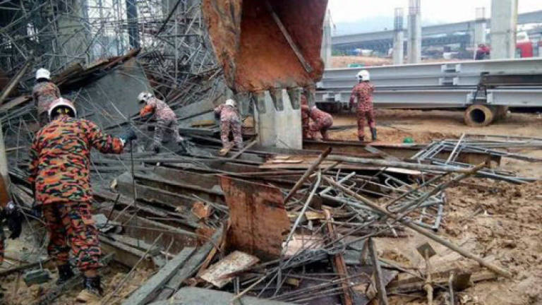 Two workers trapped under wet concrete at Putra Heights LRT site