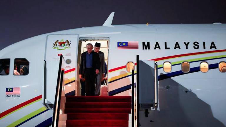 Perdana Menteri Datuk Seri Anwar Ibrahim tiba di Lapangan Terbang Antarabangsa Doha - fotoBERNAMA