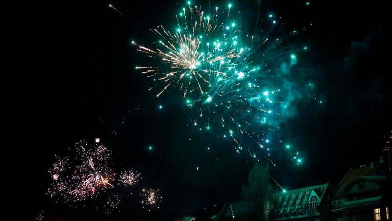 Fireworks explode over the rooftops of Berlin’s Kreuzberg district during New Year’s Eve celebrations. Photograph: David Gannon/AFP/Getty Images