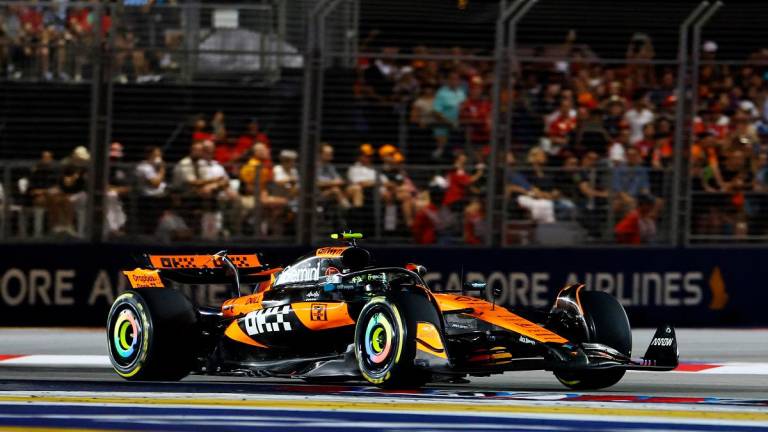 McLaren’s Lando Norris in action during the race. - REUTERS/Athit Perawongmetha