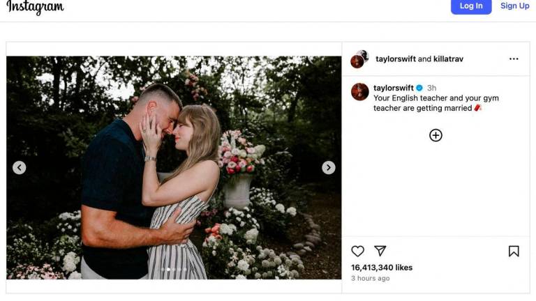 An Instagram post reading “Your English teacher and your gym teacher are getting married,“ along with a photo showing National Football League player Travis Kelce proposing to singer Taylor Swift, in this screenshot taken from a social media post, August 26, 2025. Taylor Swift via Instagram/via REUTERS