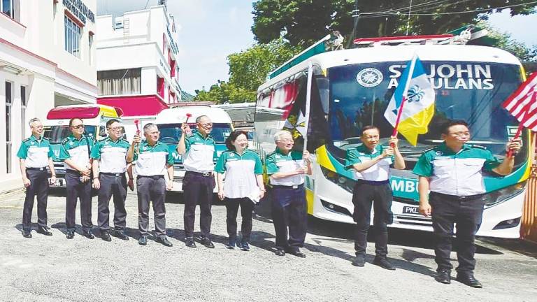 SJAM Penang officials during the launch of ‘Ops Selamat Ambulance Standby CNY’. – Pic courtesy of St John Ambulance