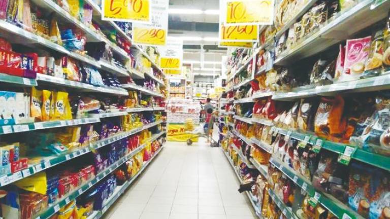 The government’s RM100 cash aid is likely to generate a temporary boost for retailers and wholesalers. – Bernama filepic
