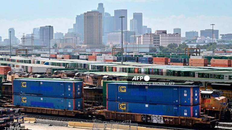 Shipping containers are seen at the rail yard at the LATC-Union Pacific Los Angeles Transportation Center on September 2, 2025 in Los Angeles. - AFP
