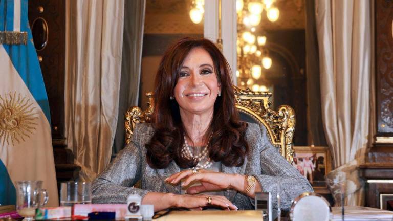 This file photo taken on September 29, 2010 shows Argentina’s President Cristina Fernandez de Kirchner during an interview with journalists at the presidential palace in Buenos Aires. (Photo by AFP / Daniel GARCIA)