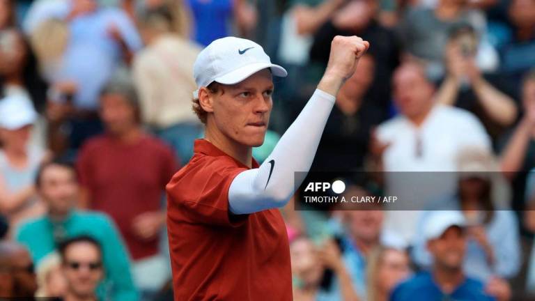 Italy's Jannik Sinner celebrates defeating Canada’s Denis Shapovalov in their men's singles third round match on day seven of the US Open tennis tournament at the USTA Billie Jean King National Tennis Center in New York City, on August 30, 2025. - AFP