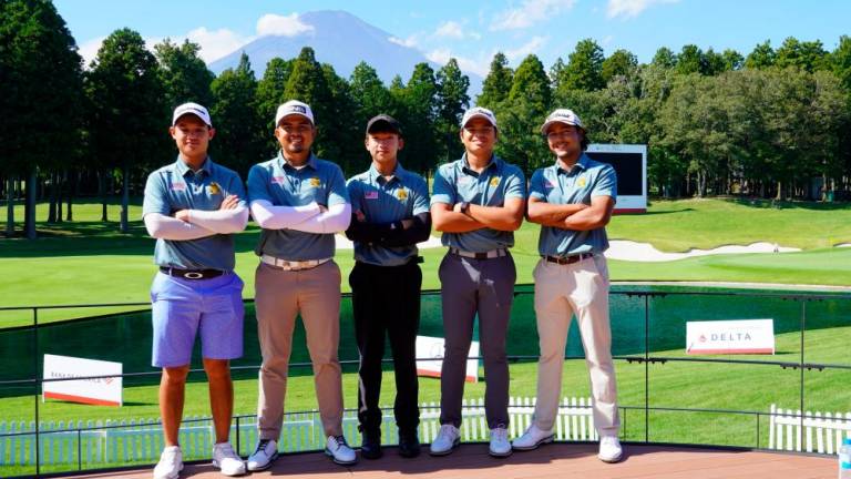 FROM LEFT: Anson Yeo, Zia Iqmal Abdul Rashid, Andrew Yap, Rizq Adam Rohizam and Zubair Firdaus at Taiheiyo Club Gotemba, with Mount Fuji in the background.