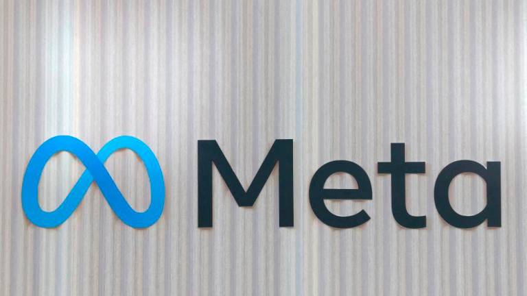 The logo of Meta is seen at the entrance of the company’s temporary stand ahead of the World Economic Forum (WEF) in Davos, Switzerland January 18, 2025. REUTERSpix