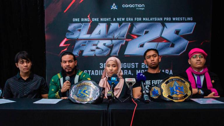 Asia-Pacific (APAC) Wrestling founder Ayez Shaukat Fonseka Mohd Farid (second from left) speaks at a press conference on Slamfest 2025 at APAC Wrestling Ground Zero today. – BERNAMA