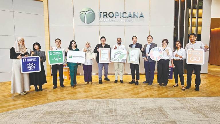 From left: Tropicana ESG senior manager Raja Zalina; Tropicana’s M&amp;S team senior executives Nik Hajar and Willie Tan; Tropicana ESG unit and Group Corp Comm senior GM Serena Lim; Green RE senior manager Nur Fateha Jamaluddin; Tan; Jeremiah Tan; Ashwin; Wong; Tropicana general manager (project) Foo Mao Hsien; Tropicana senior manager (project) Oon Khai Yee; GreenRE sales and marketing manager Juanita Lourdes; and Tropicana ESG executive Muhamad Fadli.