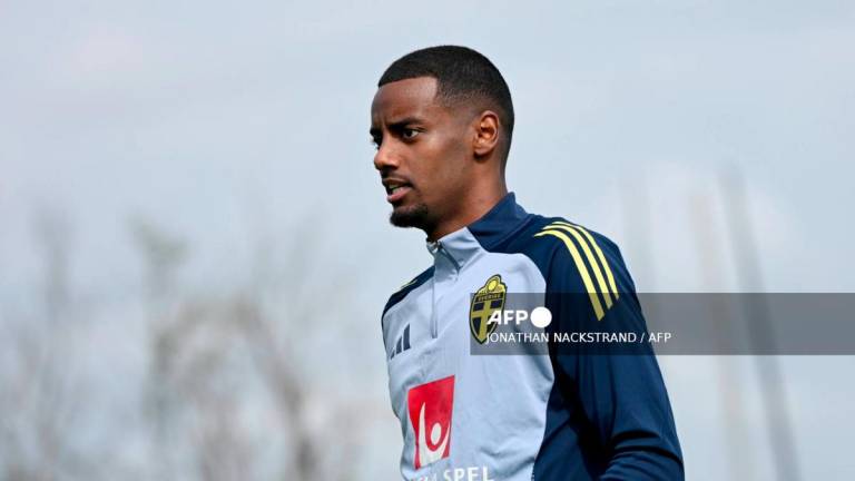 Swedish football player Alexander Isak (L) arrives for a training session with Sweden's national team in Bosön in Lidingö on the outskirts of Stockholm, Sweden, on September 2, 2025. - AFPPIX
