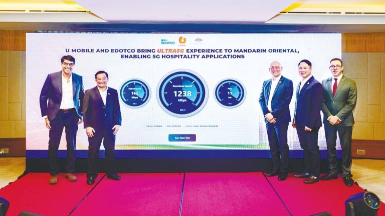 (From left) Gayan, Edotco group CEO Adlan Tajudin, U Mobile CEO Wong Heang Tuck, Woon and Mandarin Oriental Kuala Lumpur hotel manager Lluis Pou.