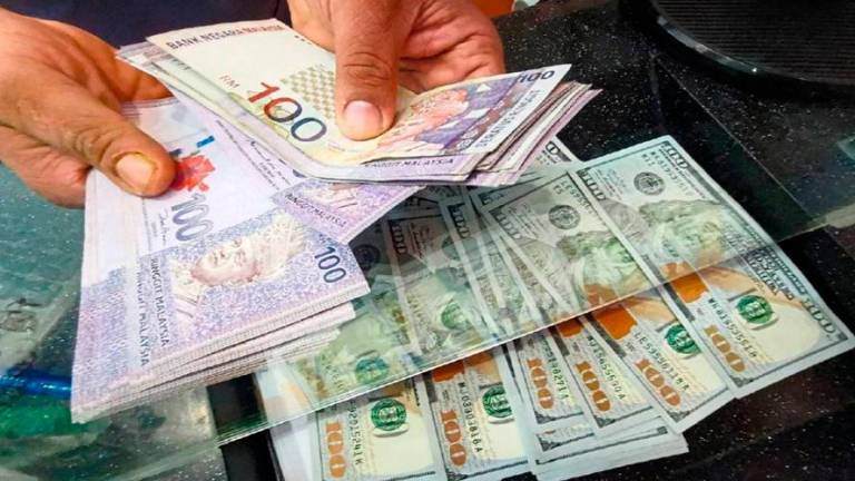 Wise advises Malaysians who send money overseas to compare the exchange rate with the mid-market rate, watch out for ‘zero-fee’ or ‘low-fee’ claims, and read the fine print. Picture for illustration only. – Bernama filepic