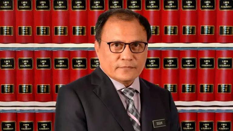 Attorney General Tan Sri Mohd Dusuki Mokhtar - Photo by BERNAMA
