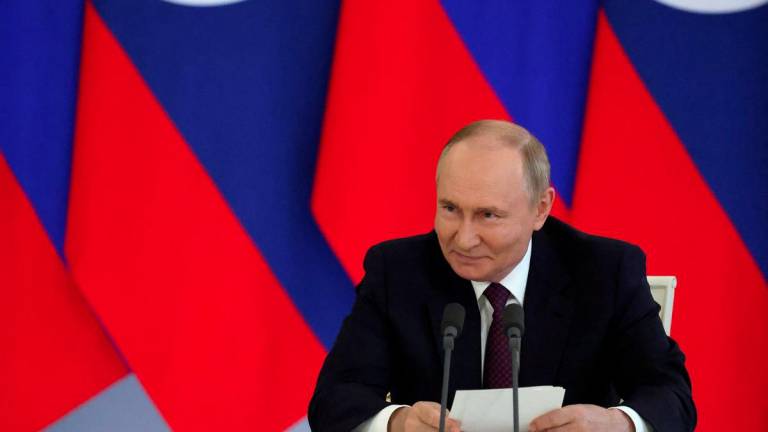 Russian President Vladimir Putin makes a statement following talks with Laotian President Thongloun Sisoulith at the Kremlin in Moscow, Russia, July 31, 2025. - REUTERSPIX