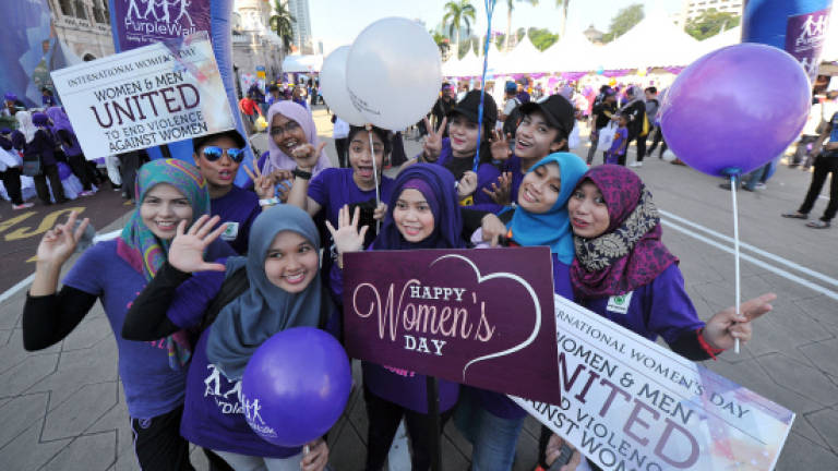 Malaysian women walk in solidarity in Purple Walk