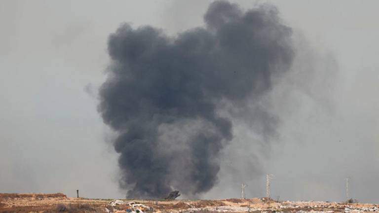Smoke rises from northern Gaza, as seen from the Israeli side of the Israel-Gaza border, May 17, 2025. REUTERSpix