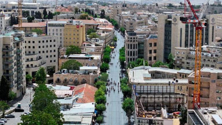 A drone view shows people standing still as a two-minute siren, marking Israel’s Memorial Day, which commemorates fallen soldiers of Israel’s wars and Israeli victims of hostile attacks, is heard in central Jerusalem April 30, 2025. REUTERSpix