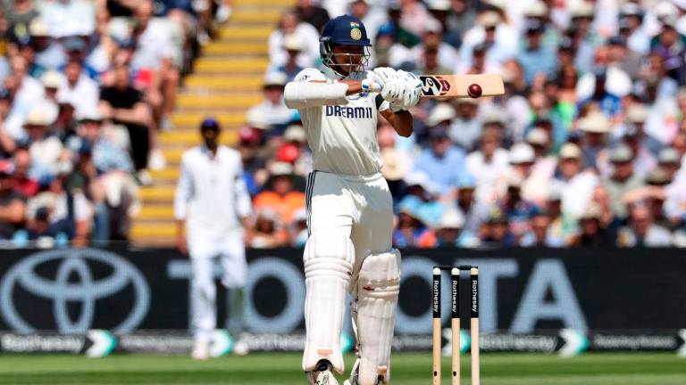 India’s Yashasvi Jaiswal plays a shot for four runs to reach his half-century on the opening day of the second cricket test match between England and India at Edgbaston cricket ground in Birmingham, central England on July 2, 2025. (Photo by Darren Staples / AFP)