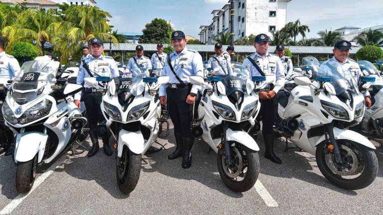 Gambar Hiasan sahaja - polis trafik-BERNAMA