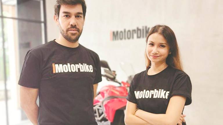 Carmo left) and Sharmeen Looi, chief marketing officer and co-founder of iMotorbike.