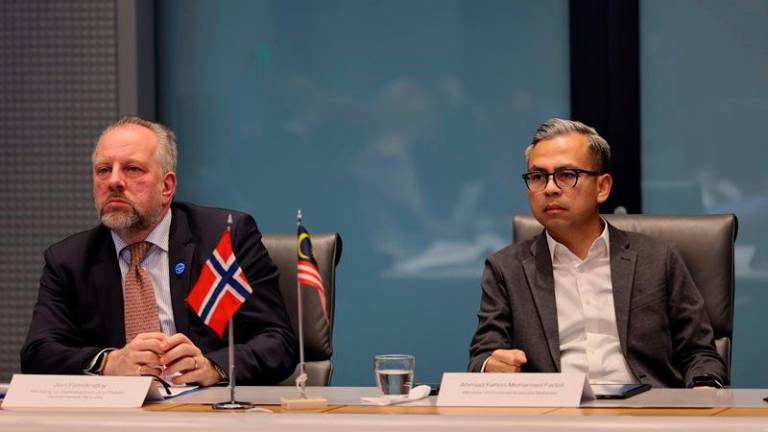 Communications Minister Fahmi Fadzil (right) attends the 'Next Generation Communications Roundtable' organised by Telenor Group at Telenor Global Headquarters, Fornebu Campus on Thursday / BERNAMApix