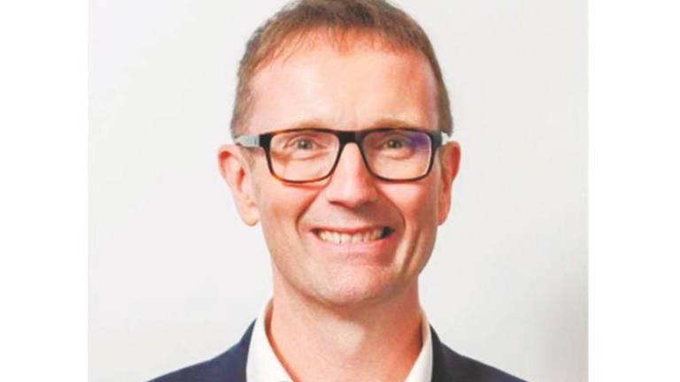 Johnson says AWS’s infrastructure strategy is built around long-term customer needs, not short-term market shifts.