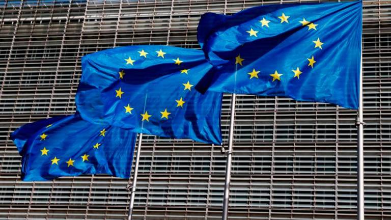 European Union flags fluttering outside the EU Commission headquarters in Brussels, Belgium. REUTERSpix