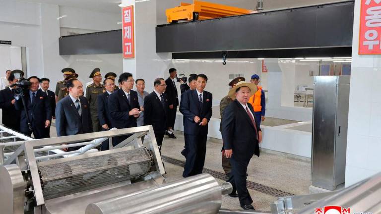 This picture taken on August 30, 2025 and released from North Korea’s official Korean Central News Agency (KCNA) on August 31, 2025 shows North Korean leader Kim Jong Un visiting the newly completed shallow-water aquaculture facility at the Ragwon County Offshore Farm in South Hamgyong Province. - South Korea OUT. Photo by KCNA VIA KNS / AFP